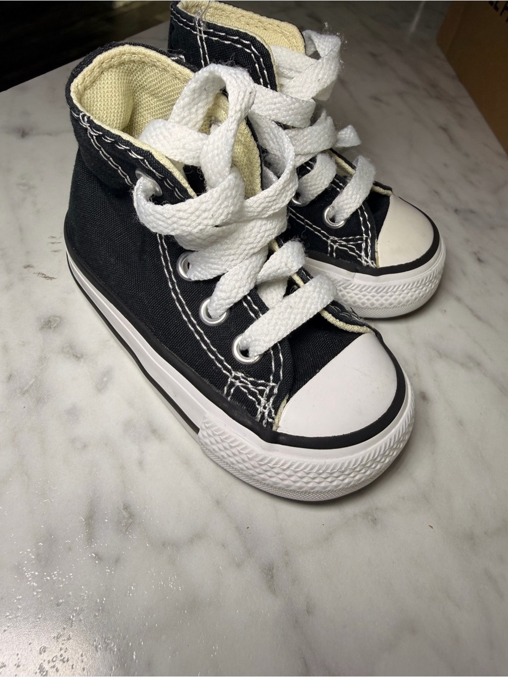 Vans Kids Black and White High-Top Canvas Sneakers